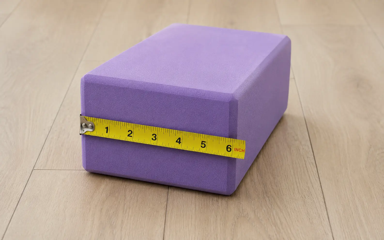 Standard yoga block with a width of 6 inches Standard yoga block with a width of 6 inches